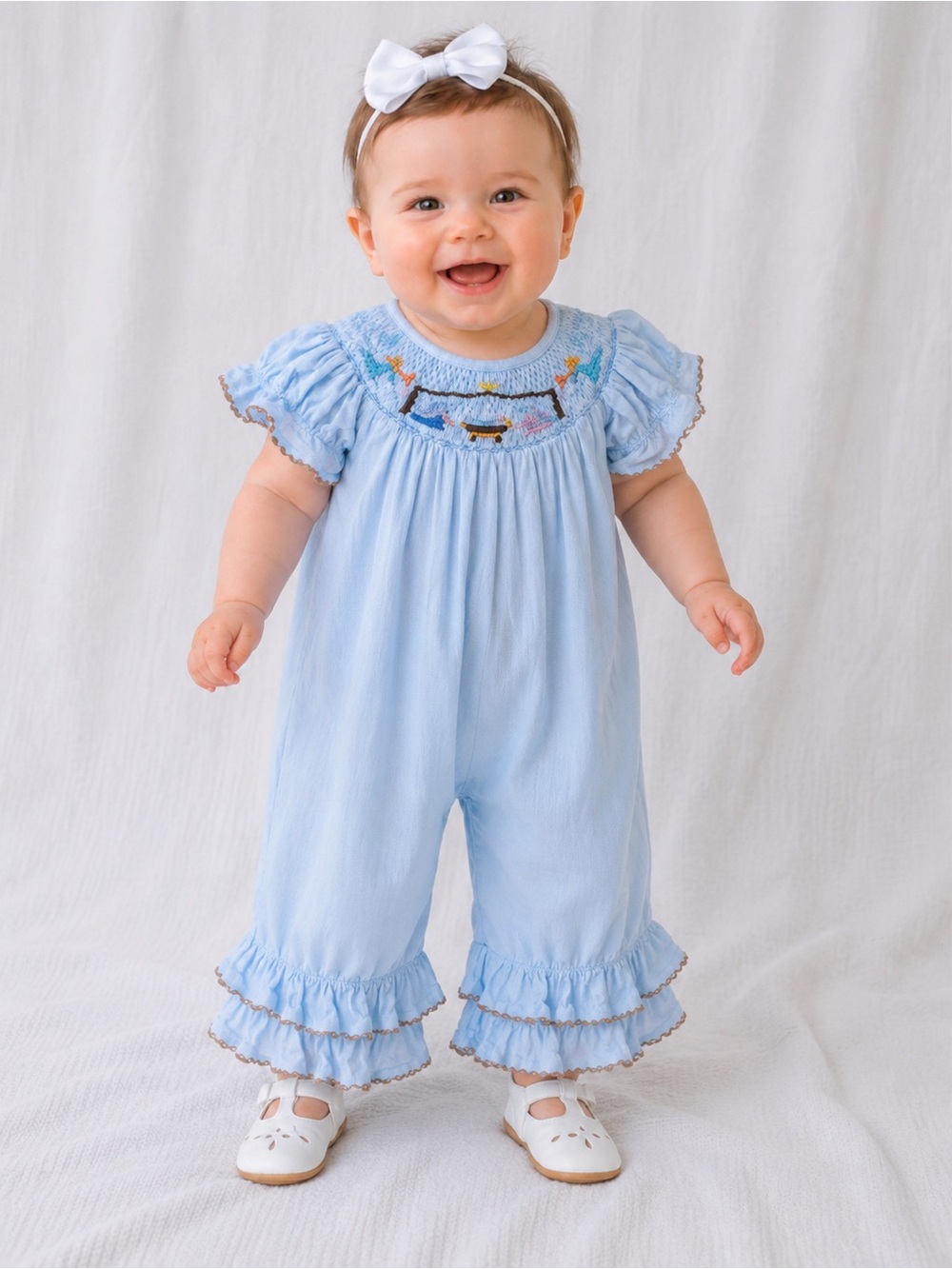 Lolly Wolly Doodle Pale Blue Smocked Romper with Multicolor Embroidery